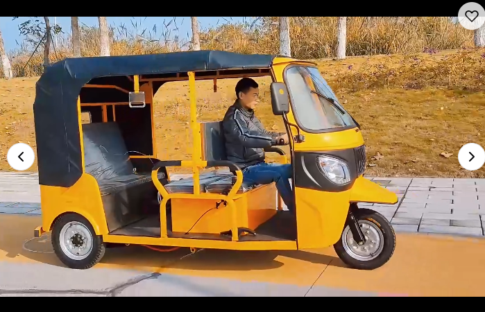 Tuk-tuk driving on site roads